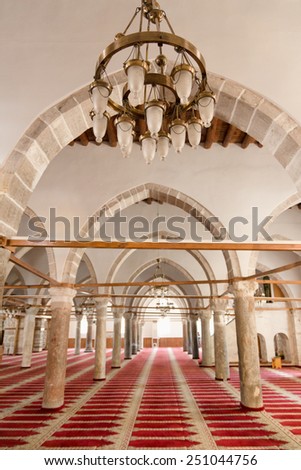Ulu Mosque was buid in 1426 by Mehmet Bey who is son of Karamanoglu ?brahim Bey. Inside of the mosque is lined with red carpet.