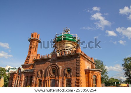 Tomsk, Russia - August 16, 2014: Red Juma Mosque of Tomsk is restoring. Red Mosque was founded in 1901 on the site of the first two wooden mosques, which were destroyed by fire.