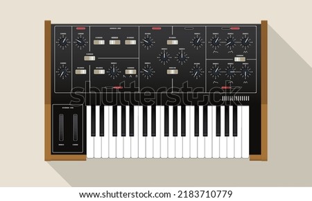 Realistic compact analog synthesizer with wood finish. An old electronic piano. Musical equipment. A device for creating sounds. Electronic music theme. Night life. Warm synth sound. A piece interior.