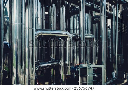 background equipment at the plant, a stainless steel pipe