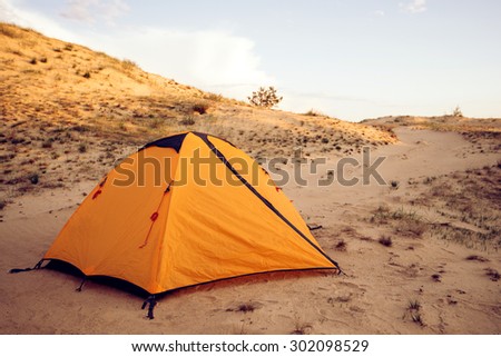 Yellow tent in the desert sands, a great place for what would have to sleep in silence. Hottest places on the planet