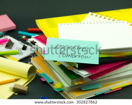 The Pile of Business Documents; Meeting Tomorrow