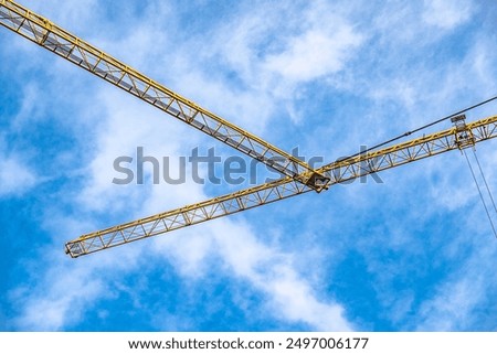 Similar – Image, Stock Photo Two cranes crossed