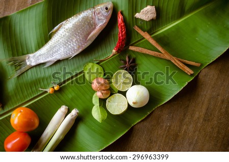 Raw of fresh fish on banana leaf.