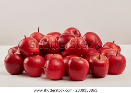 Similar – Image, Stock Photo Ripe red apples from your own tree lie neatly sorted in a wooden box