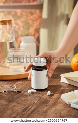 Image, Stock Photo Woman paining wooden box in blue color with brush