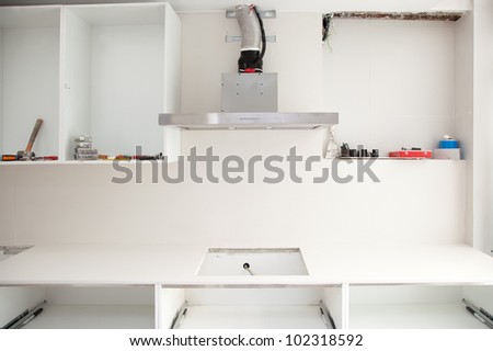 Interior design construction of a kitchen with cooker extractor fan hood