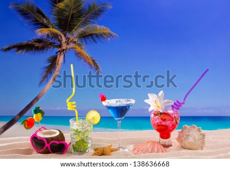 beach tropical cocktails on white sand mojito blue hawaii on white sand