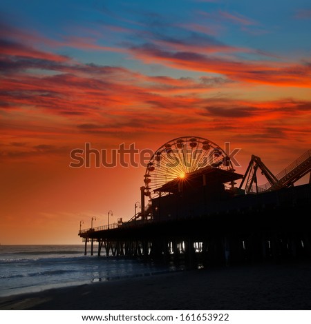 Santa Monica California sunset on Pier Ferris wheel  in orange sky