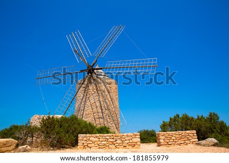 Formentera Windmill wind mill vintage masonry and wood in Mediterranean Balearic islands