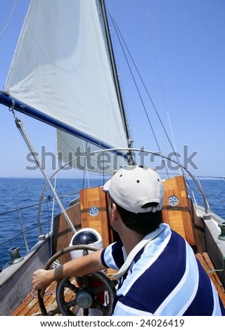 Sailor sailing in the sea. Sailboat over mediterranean blue saltwater