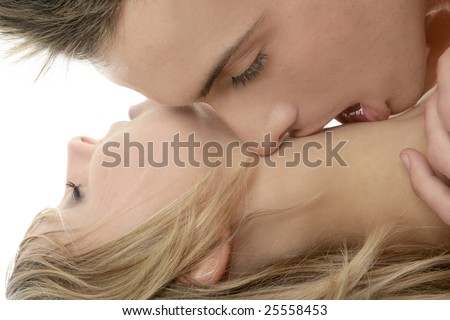 Couple natural kiss close up portrait over white background
