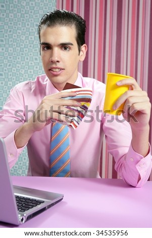 Businessman young eating fast food menu at office with laptop