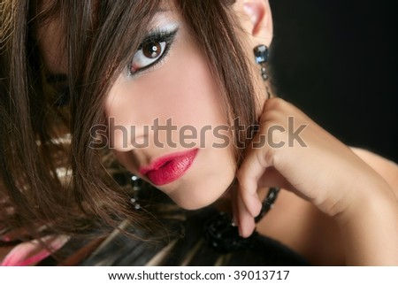 Beautiful fashion woman thinking expression over black background