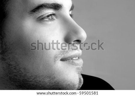 handsome profile smile portrait young man face detail closeup