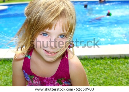 blond little girl pool garden vacation smiling portrait blue water