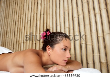beauty therapy beautiful profile woman laying bamboo background