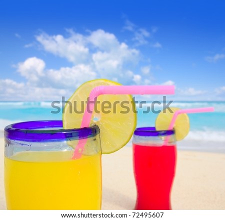 beach tropical cocktails in tropical turquoise on Caribbean Sea