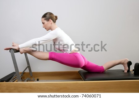 Gym Woman Pilates Stretching Sport In Reformer Bed Instructor Girl ...