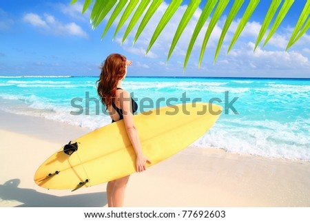 surfer woman side view tropical sea looking waves Caribbean sea [Photo Illustration]