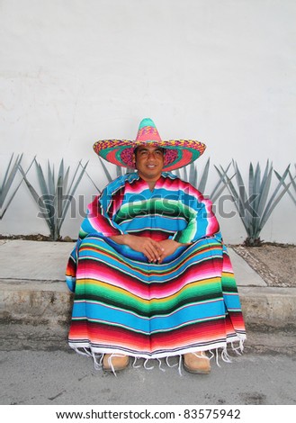 Mexican Sombrero Smiling Man Sitting With Poncho In Front Of Agave ...