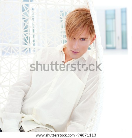 blond modern man portrait in summer terrace vampire inspiration