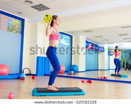 Gym woman barbell squats exercise workout at gym indoor