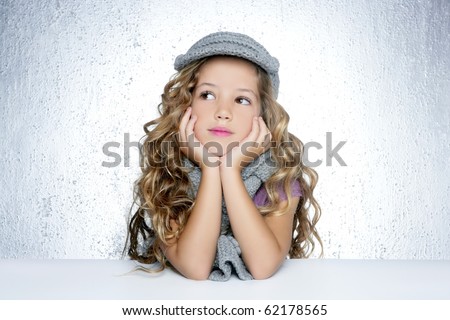 Similar – Image, Stock Photo Little blonde sweet girl is noodles with tomato sauce and smears her face with red sauce with her hand, she holds the small spoon in her hand, over a bowl and looks curiously into the camera, at home in the apartment.