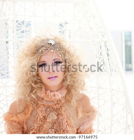 Baroque haute couture woman portrait with vampire inspiration in hammock