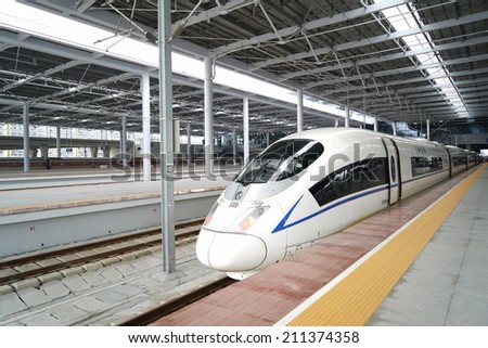 Ningbo, CHINA - August 16: High speed train departure on August 16, 2014 in Ningbo,China.China has the world\'s longest high speed rail network (over 9,300 km).