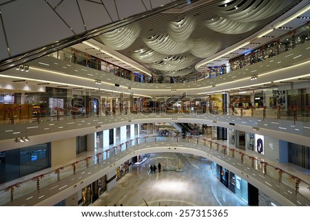 SHANGHAI, CHINA - March 2. 2015: Interior of the new IAPM Shopping Mall downtown in old French Concession. Just after Chinese new year at March 2. 2015 Shanghai, China