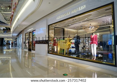 SHANGHAI, CHINA - March 2. 2015: Interior of the new IAPM Shopping Mall downtown in old French Concession. Alexander McQueen brand store inside Before Chinese new year at March 2. 2015 Shanghai, China