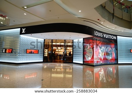 SHANGHAI, CHINA - March 8. 2015: Interior of the IFC Shopping Mall downtown in Pudong Lujiazui. LOUIS VUITTON inside Just The international women\'s day at March 8. 2015 Shanghai, China