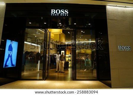 SHANGHAI, CHINA - March 8. 2015: Interior of the IFC Shopping Mall downtown in Pudong Lujiazui. HUGO BOSS inside Just The international women\'s day at March 8. 2015 Shanghai, China