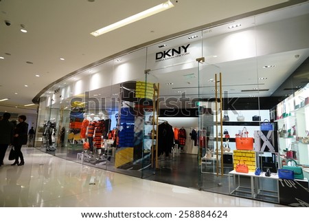 SHANGHAI, CHINA - March 8. 2015: Interior of the IFC Shopping Mall downtown in Pudong Lujiazui. DKNY inside Just The international women\'s day at March 8. 2015 Shanghai, China