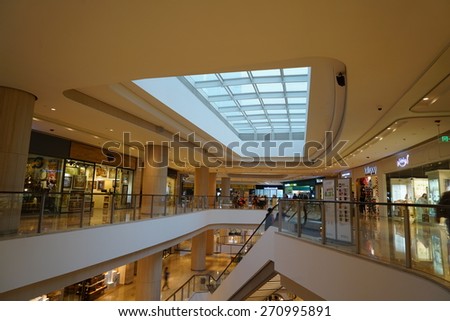 SHANGHAI, CHINA - Apr.19 2015: Interior of the luxury kerry centre shopping mall at downtown in old French Concession. Multi luxury brand inside.