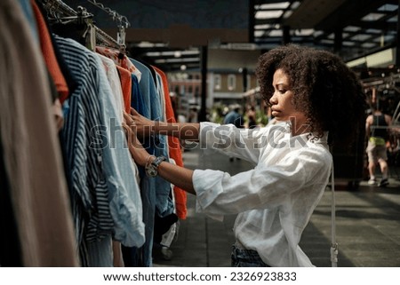 Similar – Image, Stock Photo clothes flea market