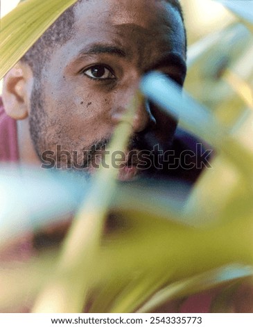 Image, Stock Photo Analog, close up portrait of a young woman sitting on a bed and looking into the camera