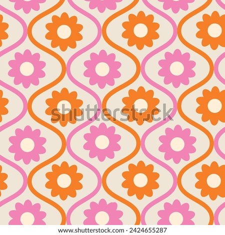 Retro groovy orange and pink flowers on mid century ogee seamless pattern. For wallpaper, home décor and fabric