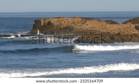 Similar – Image, Stock Photo Anonymous surfer at the beach with surfboard