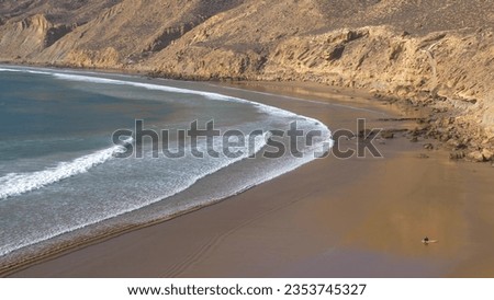 Similar – Image, Stock Photo Anonymous surfer at the beach with surfboard