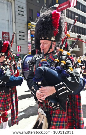 NEW YORK - APRIL 14:  Musicians dressed in full Scottish Regalia walk The Scotland Week Parade on 6th Avenue April 14, 2011 in New York, NY.
