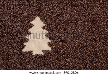 Fir tree made of roasted coffee beans on burlap
