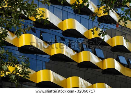building of offices with balcony yellow