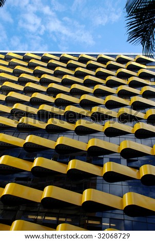 building of offices with balcony yellow
