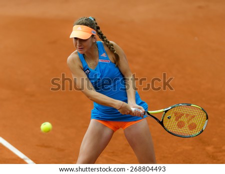 NUREMBERG, GERMANY - MAY 18: Swiss tennis player Belinda Bencic returns a ball during her Nurnberger Versicherungscup WTA tournament qualification match on May 18, 2014