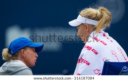 TORONTO, CANADA - AUGUST 12 :  Daria Gavrilova receives on-court coaching in action at the 2015 Rogers Cup WTA Premier 5 tennis tournament