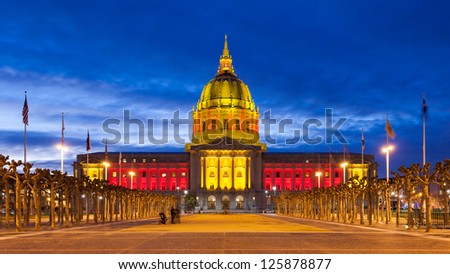 San Francisco City Hall in red and gold light in honor of the Forty Niners trip to the 2013 Super Bowl.