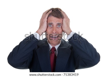 Middle Aged Business Man Holding His Head In Frustration And Despair ...