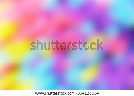 Beautiful blurred colorful abstract background. Rainbow perfect party concept behind the glass. Light and shiny colors with window effect as a concept for joy and happiness.